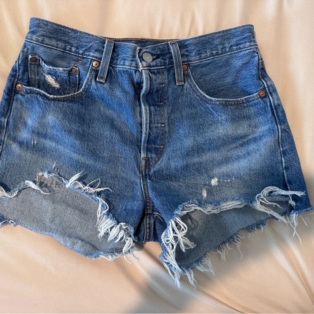 Levi's 501 Shorts. Medium wash. Size 28.